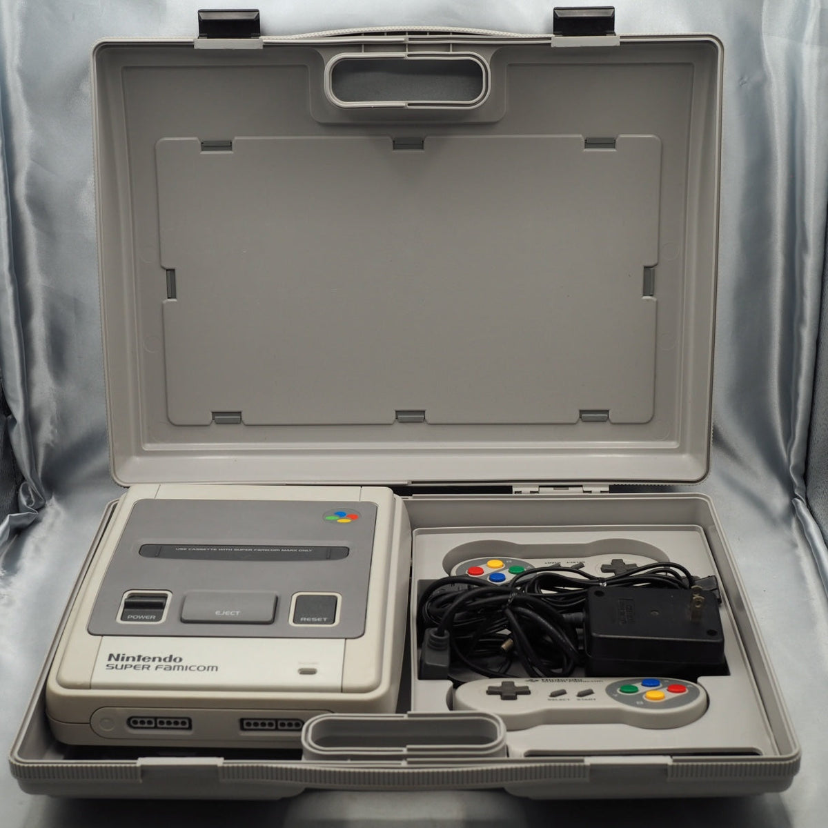 Super Famicom carry case, open, with console, 2 controllers and power adapter